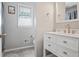 Updated bathroom with white vanity and new fixtures at 3970 Somerled Trl, Atlanta, GA 30349