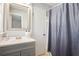 Clean bathroom with a vanity, shower, and gray walls at 3970 Somerled Trl, Atlanta, GA 30349