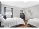 Spacious bedroom with two twin beds and ample natural light at 3970 Somerled Trl, Atlanta, GA 30349