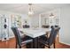 Elegant dining room with marble-top table and four chairs at 3970 Somerled Trl, Atlanta, GA 30349