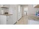 Bright laundry room with washer, dryer and built-in storage at 3970 Somerled Trl, Atlanta, GA 30349