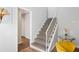 Stairwell leading to the upper level of the home at 3970 Somerled Trl, Atlanta, GA 30349