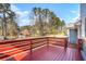 Spacious red deck overlooking backyard and trees at 501 Fond Du Lac Dr, Stone Mountain, GA 30088