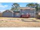 Gray house exterior with a red deck and backyard at 501 Fond Du Lac Dr, Stone Mountain, GA 30088