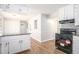 Modern kitchen with white cabinets and granite countertops at 501 Fond Du Lac Dr, Stone Mountain, GA 30088