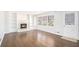 Living room with hardwood floors, fireplace, and built-in shelves at 501 Fond Du Lac Dr, Stone Mountain, GA 30088