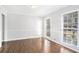 Living room with hardwood floors and neutral walls at 501 Fond Du Lac Dr, Stone Mountain, GA 30088