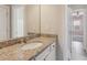 Small bathroom with granite countertop and sink at 5110 Meridian Pass, Cumming, GA 30028