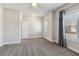 Bright bedroom with neutral walls and carpet at 5110 Meridian Pass, Cumming, GA 30028