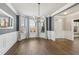 Spacious dining area with hardwood floors and bay windows at 5110 Meridian Pass, Cumming, GA 30028