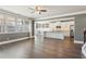 Open concept kitchen with white cabinets and granite countertops at 5110 Meridian Pass, Cumming, GA 30028