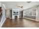 Large living area with fireplace and built-in shelving at 5110 Meridian Pass, Cumming, GA 30028