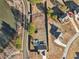 Aerial view of house and neighborhood, showcasing a private backyard and community setting at 7 Little Creek Manor Dr, Dallas, GA 30157