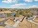 Aerial view of a house with a fenced backyard, pool and detached shed near a lake at 7 Little Creek Manor Dr, Dallas, GA 30157