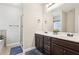 Bathroom with double vanity and large mirror at 7 Little Creek Manor Dr, Dallas, GA 30157