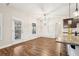 Formal dining area with hardwood floors and chandelier, near kitchen at 7 Little Creek Manor Dr, Dallas, GA 30157