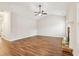 Bright living room with hardwood floors, fireplace, and vaulted ceiling at 7 Little Creek Manor Dr, Dallas, GA 30157