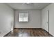 Bright bedroom featuring wood floors and a ceiling fan at 574 Northridge Crossing Dr, Sandy Springs, GA 30350