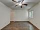 Spacious bedroom with wood-look floors and ceiling fan at 574 Northridge Crossing Dr, Sandy Springs, GA 30350