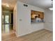 Dining area with kitchen passthrough and hardwood floors at 574 Northridge Crossing Dr, Sandy Springs, GA 30350