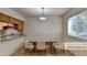 Dining area with light flooring and kitchen view at 574 Northridge Crossing Dr, Sandy Springs, GA 30350