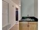 View of kitchenette featuring wood cabinets and a small sink at 574 Northridge Crossing Dr, Sandy Springs, GA 30350