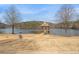 Picturesque gazebo overlooking community lake offering a tranquil escape and scenic views at 702 Berkeley Ter, Canton, GA 30115