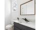 Modern bathroom with a stylish vanity and walk-in shower at 1416 Elizabeth Sw Ave, Atlanta, GA 30310