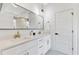 Modern bathroom with double vanity, large mirror, and bright lighting at 1416 Elizabeth Sw Ave, Atlanta, GA 30310