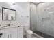 Clean bathroom with white vanity and grey tile shower at 1416 Elizabeth Sw Ave, Atlanta, GA 30310
