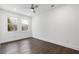 Simple bedroom with wood floors and lots of natural light at 1416 Elizabeth Sw Ave, Atlanta, GA 30310