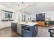Modern kitchen with a large island and stainless steel appliances at 1416 Elizabeth Sw Ave, Atlanta, GA 30310
