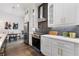 Modern kitchen with stainless steel appliances and white shaker cabinets at 1416 Elizabeth Sw Ave, Atlanta, GA 30310