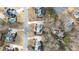 Aerial view of this neighborhood shows the house on a cul-de-sac street with mature trees at 305 Corrigan Trce, Peachtree City, GA 30269