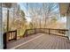 This back deck provides an amazing view of the surrounding wooded landscape and neighborhood at 305 Corrigan Trce, Peachtree City, GA 30269