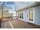 Entertain outdoors on this back deck, which offers an entry door and large windows into the home at 305 Corrigan Trce, Peachtree City, GA 30269