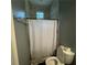 Small bathroom with shower and toilet at 3499 New Macland Rd, Powder Springs, GA 30127