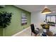 Modern dining room featuring a statement wall and glass table at 684 Tarkington Rd, Stone Mountain, GA 30088