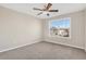 Bedroom with ceiling fan and large window at 1209 Westgate Dr, Lilburn, GA 30047