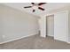 Spacious bedroom with closet and ceiling fan at 1209 Westgate Dr, Lilburn, GA 30047