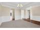 Dining room with hardwood floors, wainscoting, and chandelier at 1209 Westgate Dr, Lilburn, GA 30047