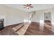 Living room with hardwood floors, fireplace, and access to entryway at 1209 Westgate Dr, Lilburn, GA 30047