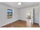 Light-filled bedroom with hardwood floors and access to the living room at 363 Roselane Nw St, Marietta, GA 30060