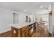 Open kitchen with island and hardwood floors, view to living room at 363 Roselane Nw St, Marietta, GA 30060