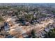 Aerial view of neighborhood featuring homes and trees at 390 Wayside Dr, Lawrenceville, GA 30046