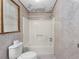 Bathroom with shower/tub and tiled walls at 390 Wayside Dr, Lawrenceville, GA 30046