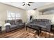 Living room with hardwood floors, two sofas, and a coffee table at 390 Wayside Dr, Lawrenceville, GA 30046