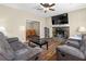 Spacious living room with stone fireplace and hardwood floors at 390 Wayside Dr, Lawrenceville, GA 30046