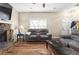 Living area with hardwood floors and a stone fireplace at 390 Wayside Dr, Lawrenceville, GA 30046