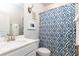 Clean bathroom with white vanity and blue shower curtain at 830 Corsiglia, Marietta, GA 30060